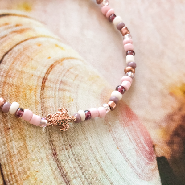 Red de schildpadden armbandje roze - Afbeelding 2